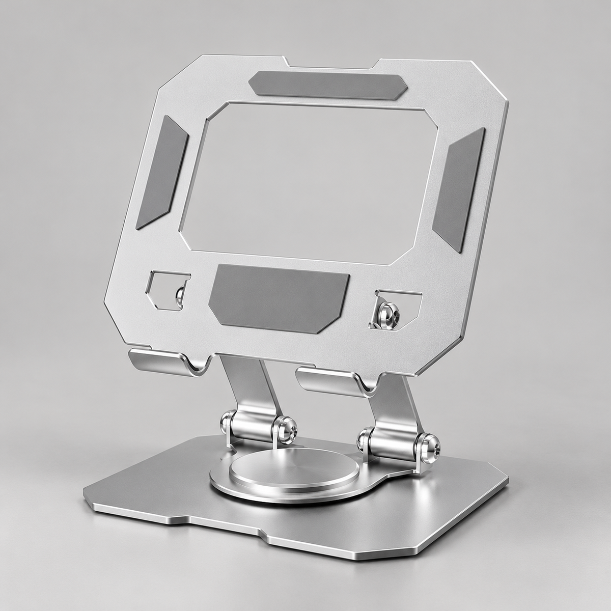 The tablet stand in frost silver, with articulated arms and a rotating base